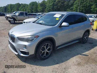 2018 BMW X1 xDrive28i with VIN WBXHT3C39J5L27926, listed as a IAAI auction lot 42582330 with 101,197 mi miles and . Bid and sale history available at DreamBid. Image 17.