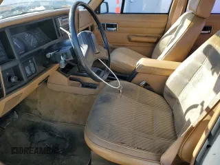 1988 Jeep Cherokee with VIN 1JCMR7813JT058390, listed as a Copart auction lot 89071925 with 2,331,297 mi miles and Clean title. Bid and sale history available at DreamBid. Image 7.
