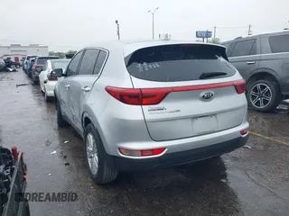 2018 Kia Sportage LX with VIN KNDPM3AC7J7337951, listed as a IAAI auction lot 41900482 with 105,857 mi miles and . Bid and sale history available at carsss.com. Image 3.