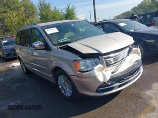 2015 Chrysler Town & Country Limited Platinum with VIN 2C4RC1GGXFR619209, listed as a IAAI auction lot 40366234 with 163,649 mi miles. Bid and sale history available at carsss.com. Image 1.