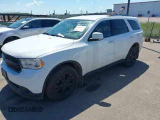 2013 Dodge Durango Crew with VIN 1C4RDJDG8DC664544, listed as a IAAI auction lot 42608957 with 202,564 mi miles and . Bid and sale history available at DreamBid. Image 2.