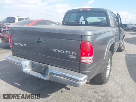 2003 Dodge Dakota SLT with VIN 1D7HL48N23S247441, listed as a IAAI auction lot 41359296 with 58,414 mi miles. Bid and sale history available at carsss.com. Image 4.