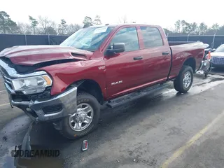 2021 Ram 2500 Tradesman with VIN 3C6UR5CJ5MG695738, listed as a IAAI auction lot 41463849 with 99,735 mi miles. Bid and sale history available at carsss.com. Image 2.