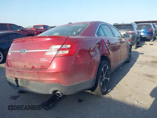 2014 Ford Taurus SEL with VIN 1FAHP2E80EG159131, listed as a IAAI auction lot 42004296 with 140,213 mi miles and . Bid and sale history available at DreamBid. Image 4.