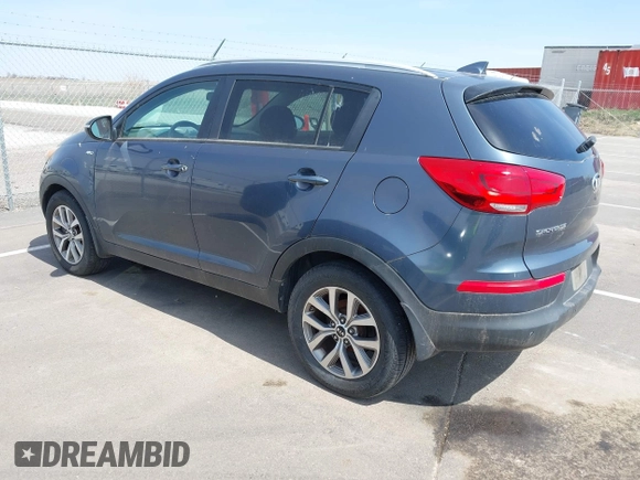 2014 Kia Sportage LX with VIN KNDPBCAC2E7648831, listed as a IAAI auction lot 41963773 with 118,399 mi miles and . Bid and sale history available at carsss.com. Image 3.