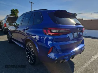 2021 BMW X5 M z VIN 5YMJU0C01M9F01267, wystawiony jako Copart lot #82042094 z przebiegiem 99 906 mil mil oraz Czysty tytuł • Clean title. Historia ofert i sprzedaży dostępna na DreamBid. Obrazek 3.