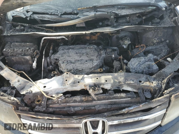 2012 Honda Odyssey Touring with VIN 5FNRL5H9XCB022284, listed as a Copart auction lot 82766824 with Not provided miles and Salvage title. Bid and sale history available at DreamBid. Image 12.