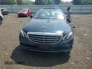 2017 Mercedes-Benz E 300 Luxury with VIN WDDZF4KBXHA185598, listed as a Copart auction lot 61011935 with 59,116 mi miles and Salvage title. Bid and sale history available at DreamBid. Image 13.