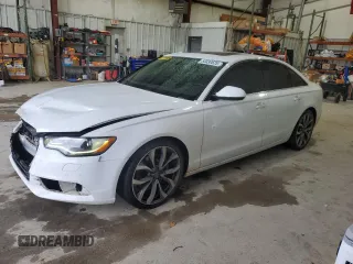 2014 Audi A6 Premium Plus z VIN WAUGFAFC1EN079576, wystawiony jako Copart lot #53330625 z przebiegiem 124 943 mil mil oraz Szkoda całkowita • Salvage title. Historia ofert i sprzedaży dostępna na DreamBid. Obrazek 1.