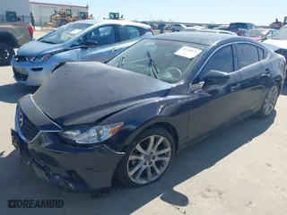 2015 Mazda Mazda6 i Touring with VIN JM1GJ1V51F1179528, listed as a IAAI auction lot 41754576 with 83,310 mi miles. Bid and sale history available at carsss.com. Image 2.