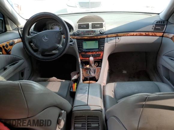 2004 Mercedes-Benz E-Class 5.0L with VIN WDBUF70J84A492244, listed as a Copart auction lot 61143664 with 165,750 mi miles and Salvage Title. Bid and sale history available at carsss.com. Image 8.