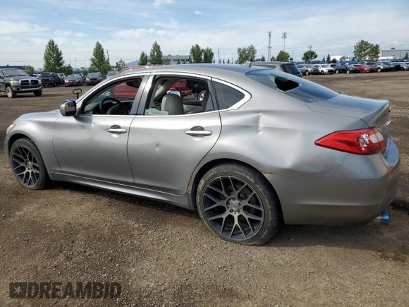 2011 Infiniti M with VIN JN1BY1ARXBM370844, listed as a Copart auction lot 62425515 with 277,315 mi miles and Salvage title. Bid and sale history available at DreamBid. Image 2.