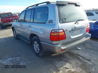 1999 Toyota Land Cruiser with VIN JT3HT05J2X0038906, listed as a IAAI auction lot 41245814 with 1 mi miles. Bid and sale history available at carsss.com. Image 3.