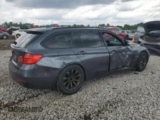 2014 BMW 3 Series 328d xDrive with VIN WBA3K5C59EKT33205, listed as a Copart auction lot 65216574 with 202,927 mi miles and Salvage title. Bid and sale history available at DreamBid. Image 3.