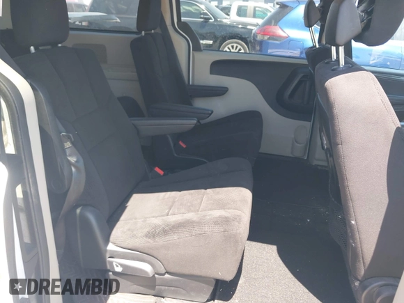2014 Dodge Grand Caravan American Value with VIN 2C4RDGBG5ER187005, listed as a IAAI auction lot 42018333 with 216,149 mi miles and . Bid and sale history available at DreamBid. Image 8.
