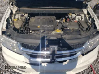 2015 Dodge Journey American Value with VIN 3C4PDCAB4FT531380, listed as a Copart auction lot 53103135 with 164,802 mi miles and Salvage Title. Bid and sale history available at DreamBid. Image 12.