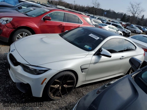 2018 BMW M4 with VIN WBS4Y9C52JAC87077, listed as a Copart auction lot 44323394 with 18,253 mi miles. Bid and sale history available at carsss.com. Image 2.