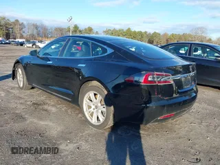 2020 Tesla Model S Long Range with VIN 5YJSA1E24LF413888, listed as a IAAI auction lot 41214903 with 42,711 mi miles and . Bid and sale history available at DreamBid. Image 3.