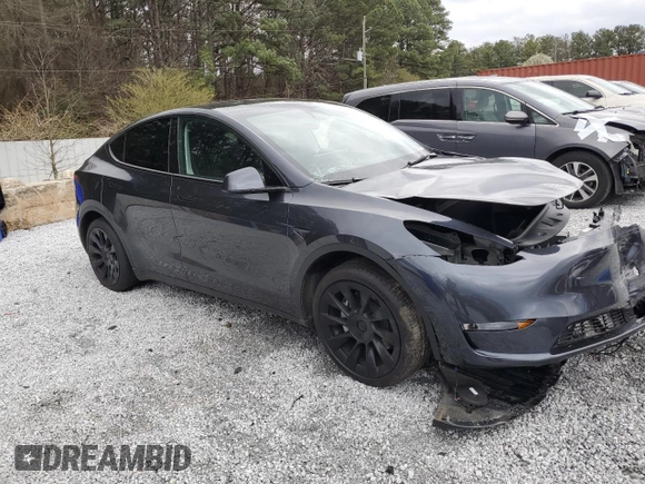 2025 Tesla Model Y Long Range with VIN 7SAYGDED9SA341967, listed as a Copart auction lot 47368695 with 4,310 mi miles and Salvage Title. Bid and sale history available at DreamBid. Image 4.