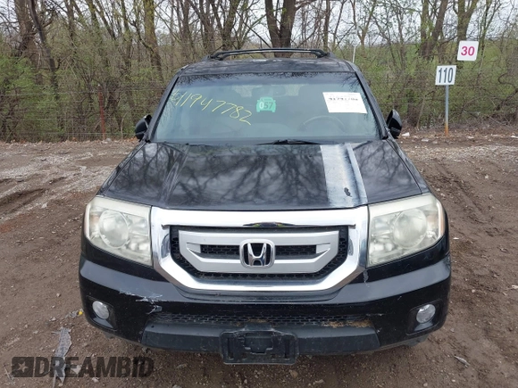 2009 Honda Pilot Touring with VIN 5FNYF48959B016978, listed as a IAAI auction lot 41947782 with 234,115 mi miles and . Bid and sale history available at carsss.com. Image 17.