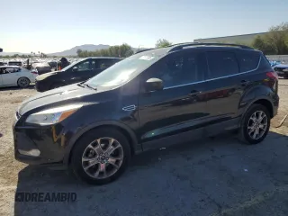 2013 Ford Escape SE z VIN 1FMCU0GX8DUA38056, wystawiony jako Copart lot #57617885 z przebiegiem 128 467 mil mil oraz Szkoda całkowita • Salvage title. Historia ofert i sprzedaży dostępna na DreamBid. Obrazek 1.