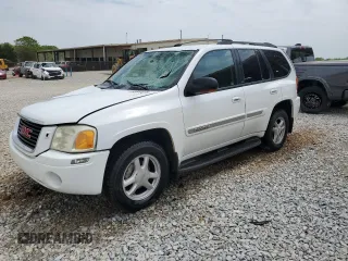 2003 GMC Envoy SLE z VIN 1GKDS13S732160159, wystawiony jako Copart lot #52587275 z przebiegiem 265 613 mil mil oraz Szkody całkowita. Historia ofert i sprzedaży dostępna na DreamBid. Obrazek 1.