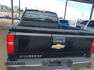 2014 Chevrolet Silverado 1500 LT with VIN 1GCVKREC5EZ325771, listed as a IAAI auction lot 41691858 with 123,475 mi miles and . Bid and sale history available at DreamBid. Image 17.