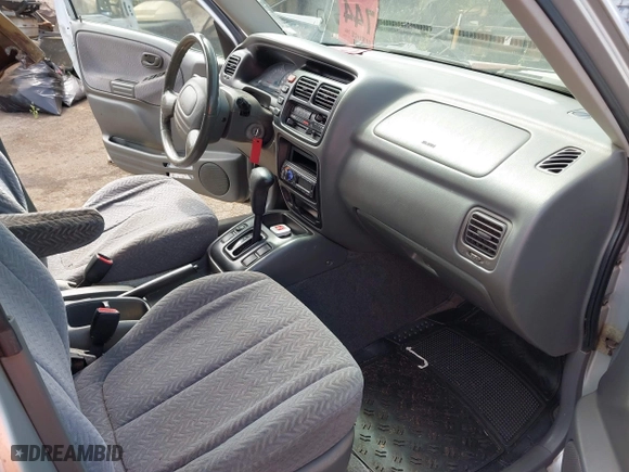 2002 Suzuki Grand Vitara with VIN JS3TE62VX24154173, listed as a IAAI auction lot 41711181 with 224,024 mi miles. Bid and sale history available at carsss.com. Image 5.