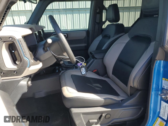 2023 Ford Bronco with VIN 1FMEE5DP7PLB92288, listed as a Copart auction lot 49272285 with 8,591 mi miles and Salvage Title. Bid and sale history available at DreamBid. Image 7.