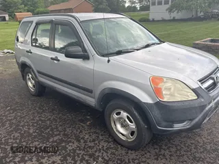 2003 Honda CR-V LX z VIN SHSRD68403U100961, wystawiony jako Copart lot #59201005 z przebiegiem 186 664 mil mil oraz Czysty tytuł • Clean title. Historia ofert i sprzedaży dostępna na DreamBid. Obrazek 1.