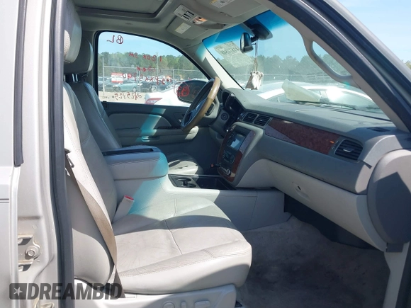 2007 Chevrolet Suburban LS with VIN 1GNFC16087J239886, listed as a IAAI auction lot 41874548 with 303,014 mi miles and . Bid and sale history available at DreamBid. Image 5.