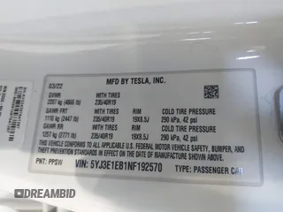 2022 Tesla Model 3 Long Range z VIN 5YJ3E1EB1NF192570, wystawiony jako IAAI lot #42230750 z przebiegiem 63 462 mil mil oraz . Historia ofert i sprzedaży dostępna na DreamBid. Obrazek 9.