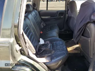 1996 Jeep Grand Cherokee Laredo with VIN 1J4FX58S1TC169501, listed as a Copart auction lot 59143174 with 0 mi miles and Salvage Title. Bid and sale history available at carsss.com. Image 10.