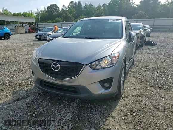 2014 Mazda CX-5 Touring z VIN JM3KE2CY0E0412733, wystawiony jako Copart lot #55803865 z przebiegiem 161 539 mil mil oraz Szkoda całkowita • Salvage title. Historia ofert i sprzedaży dostępna na DreamBid. Obrazek 14.