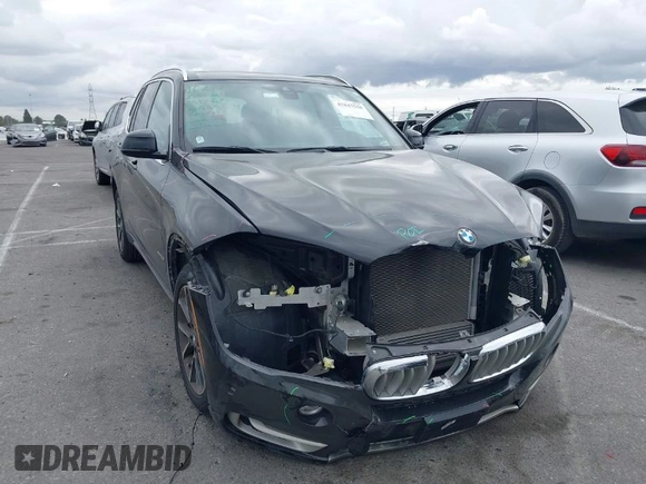 2018 BMW X5 xDrive35i with VIN 5UXKR0C55JL073210, listed as a IAAI auction lot 42047558 with 37,497 mi miles. Bid and sale history available at carsss.com. Image 1.