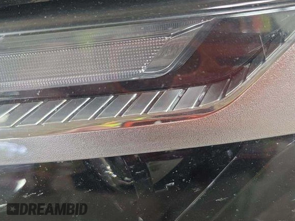 2022 Toyota RAV4 Hybrid XLE Premium with VIN 4T3B6RFV2NU084419, listed as a IAAI auction lot 42729518 with 76,607 mi miles and . Bid and sale history available at DreamBid. Image 8.