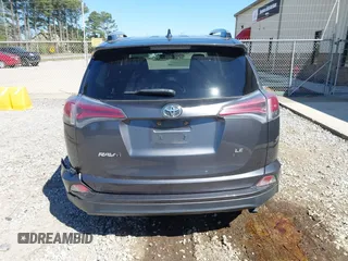 2016 Toyota RAV4 LE with VIN JTMZFREV5GJ078051, listed as a IAAI auction lot 41858381 with 97,032 mi miles and . Bid and sale history available at DreamBid. Image 16.