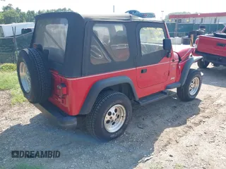 1997 Jeep Wrangler Sport with VIN 1J4FY19S3VP425119, listed as a IAAI auction lot 42592583 with 54,595 mi miles and . Bid and sale history available at DreamBid. Image 4.