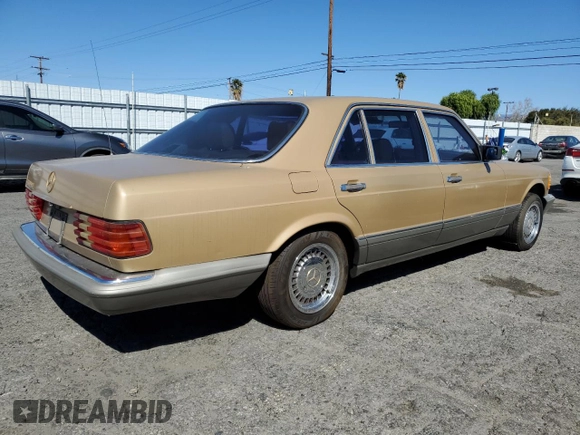 1987 Mercedes-Benz 560 with VIN WDBCA39D1HA280016, listed as a Copart auction lot 46277905 with 151,078 mi miles and Clean Title. Bid and sale history available at DreamBid. Image 3.