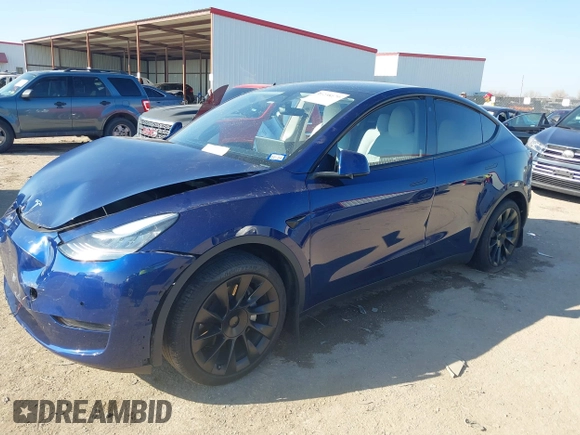 2021 Tesla Model Y Standard Range with VIN 5YJYGDED5MF121874, listed as a IAAI auction lot 41238170 with 72,041 mi miles and . Bid and sale history available at DreamBid. Image 17.