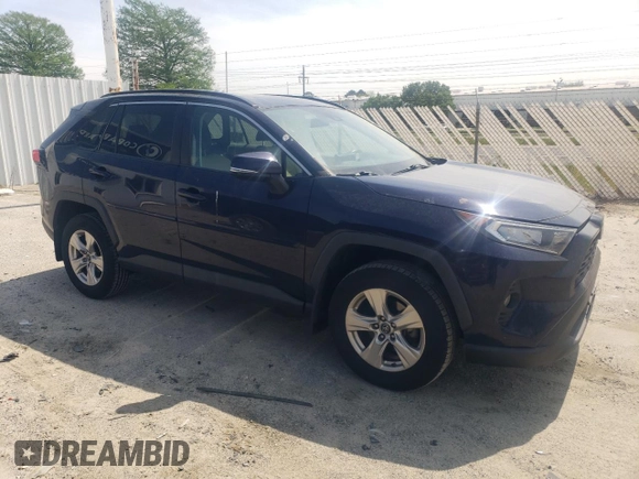 2019 Toyota RAV4 XLE with VIN 2T3W1RFV0KC027858, listed as a Copart auction lot 54301995 with 145,669 mi miles and Salvage Title. Bid and sale history available at carsss.com. Image 4.