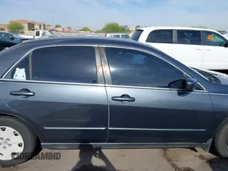 2003 Honda Accord LX z VIN 3HGCM563X3G703798, wystawiony jako IAAI lot #42245680 z przebiegiem 200 875 mil mil oraz . Historia ofert i sprzedaży dostępna na DreamBid. Obrazek 13.