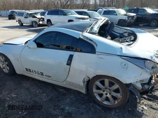 2003 Nissan 350Z Enthusiast with VIN JN1AZ34D83T117940, listed as a IAAI auction lot 41842690 with 165,379 mi miles. Bid and sale history available at carsss.com. Image 14.