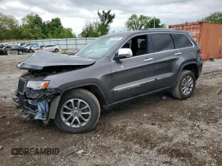 2014 Jeep Grand Cherokee Limited with VIN 1C4RJFBM1EC352484, listed as a Copart auction lot 57983305 with 157,143 mi miles and Salvage title. Bid and sale history available at DreamBid. Image 1.