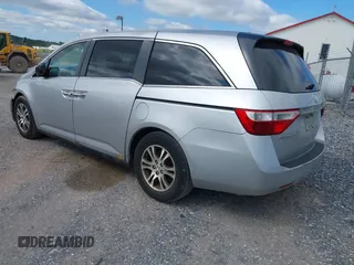 2012 Honda Odyssey EX-L with VIN 5FNRL5H63CB063815, listed as a IAAI auction lot 42302937 with 377,768 mi miles and . Bid and sale history available at DreamBid. Image 3.