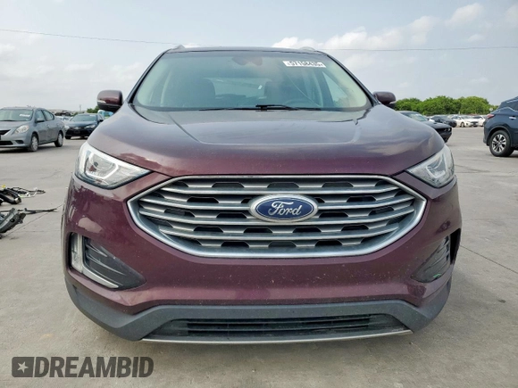 2019 Ford Edge SEL with VIN 2FMPK4J90KBB68182, listed as a Copart auction lot 57158435 with 71,598 mi miles and Salvage title. Bid and sale history available at DreamBid. Image 5.