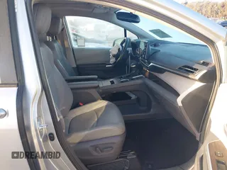 2021 Toyota Sienna XLE with VIN 5TDYRKEC2MS074448, listed as a IAAI auction lot 41946030 with 122,509 mi miles and . Bid and sale history available at DreamBid. Image 5.