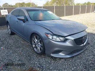 2014 Mazda 6 i Touring with VIN JM1GJ1T6XE1146263, listed as a IAAI auction lot 42187378 with 111,533 mi miles and . Bid and sale history available at DreamBid. Image 1.