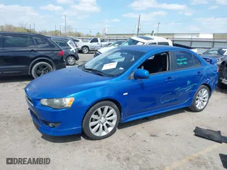 2009 Mitsubishi Lancer GTS with VIN JA3AU86W79U013299, listed as a IAAI auction lot 41765639 with 116,655 mi miles. Bid and sale history available at carsss.com. Image 17.