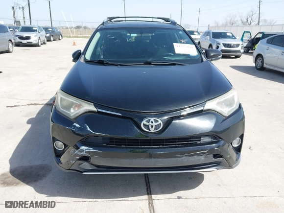 2016 Toyota RAV4 XLE with VIN 2T3WFREV9GW292772, listed as a IAAI auction lot 41727898 with 117,922 mi miles. Bid and sale history available at carsss.com. Image 12.